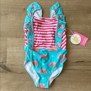 Ruffle Butts Swimming Suit.  Girl’s size 5. New with tags. One piece.